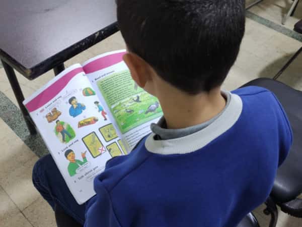 Adnan is an orphan boy from Idleb
