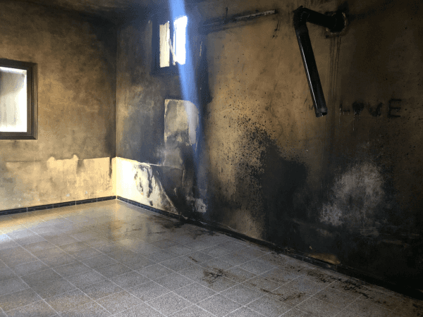 A family whose house was burned
