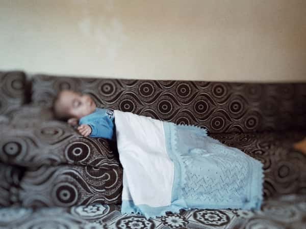 A preemie born child that gets nourished through a G-tube