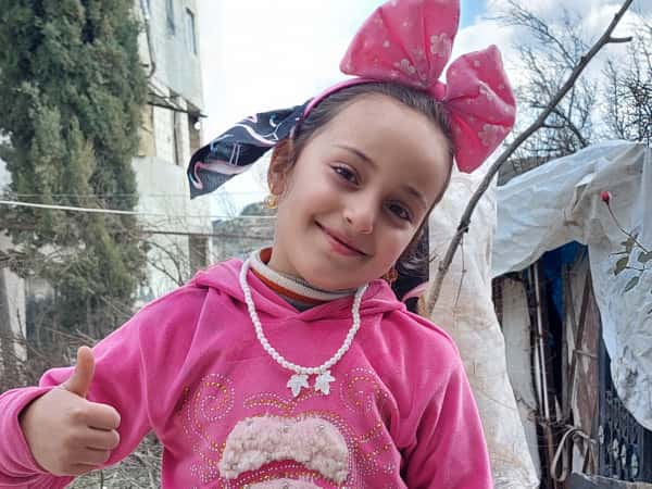 Alaa is a child orphaned by the earthquake.