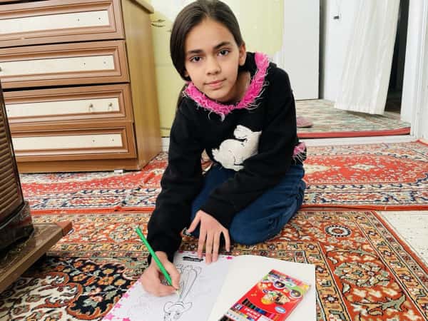 Alisar, an orphan from Homs.
