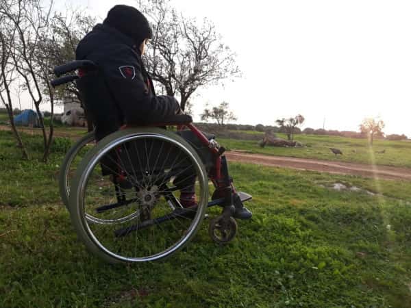 a young woman with paralyzed leg