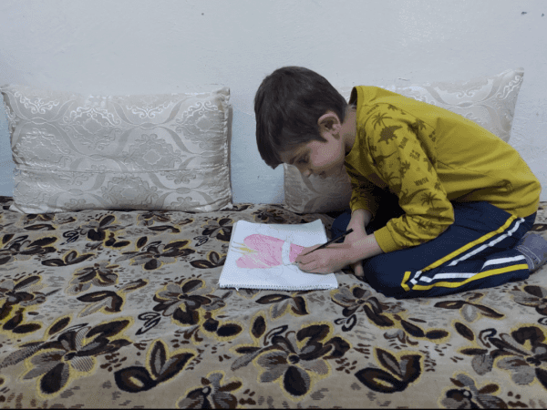 محمد طفل يتيم من ريف حلب