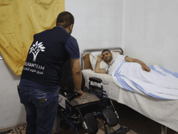 man who needs batteries for electrical wheelchair