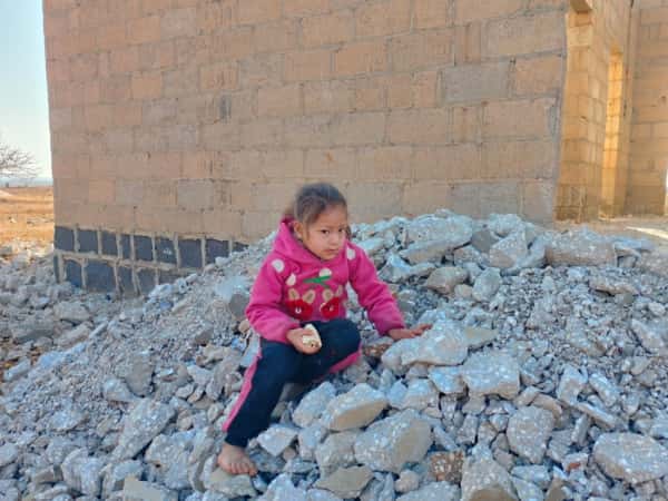 A father whose back is burdened with worry