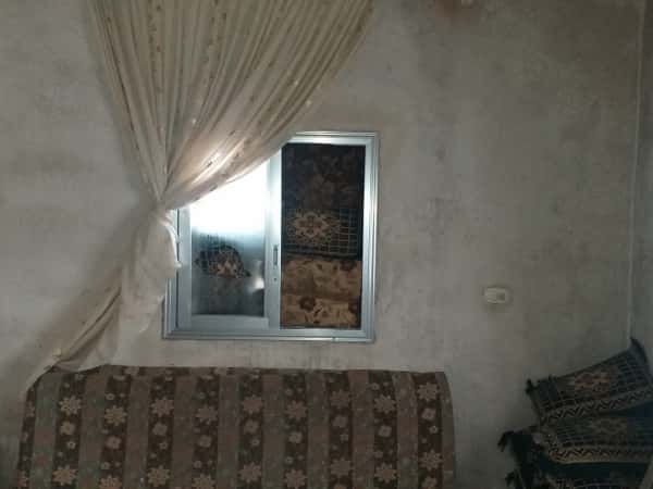 A widow living with her children in dire poverty