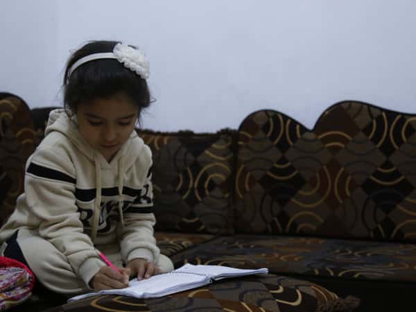 Aisha, an orphan girl from Homs