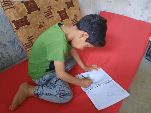 Khaled is orphaned child and needs your support