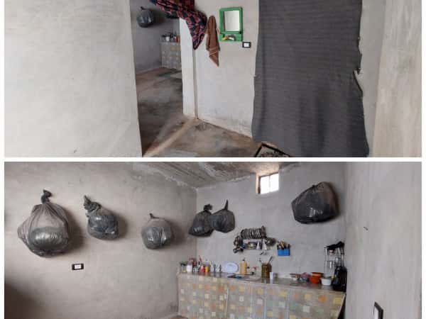 A family living in a simple house lacking essentials of life