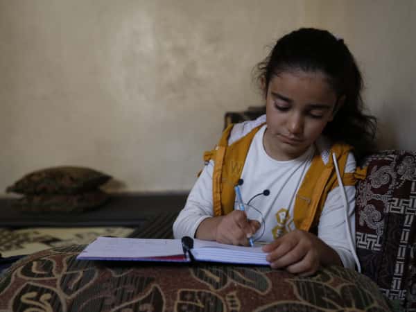 Ayat is a girl from Homs