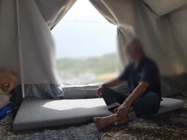 A family living in a poor tent