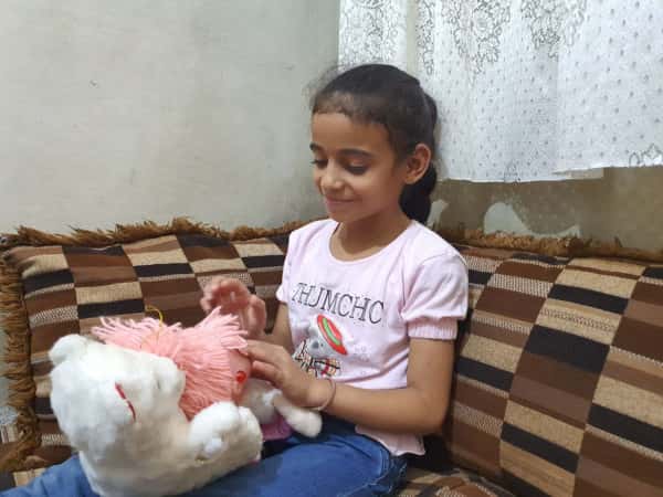 Aisha is an orphan girl from the Damascus countryside