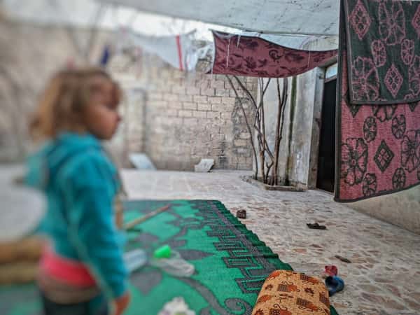 Shaimaa, a child who suffers from cerebral atrophy and inability to afford the basic necessities after she was displaced along with her family