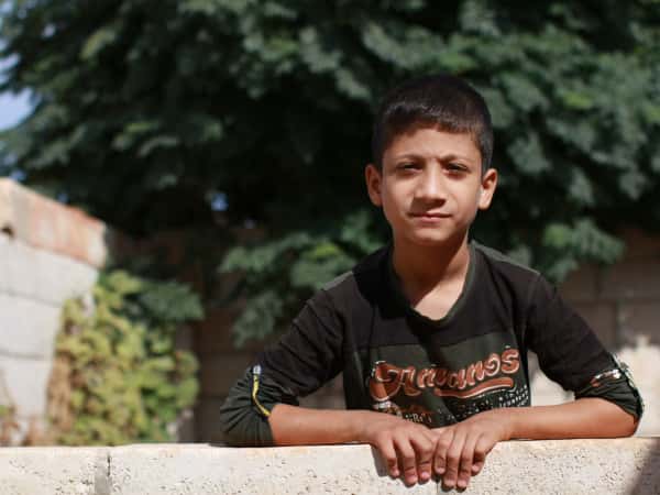 Talal est enfant orphelin de la ville de Homs