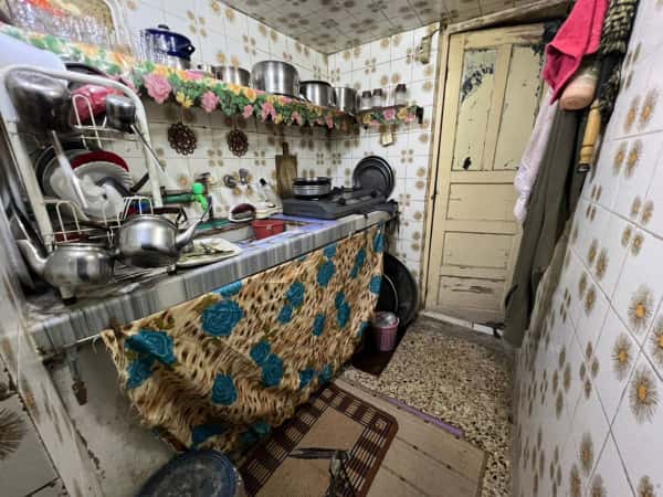 A small family carrying a big burden