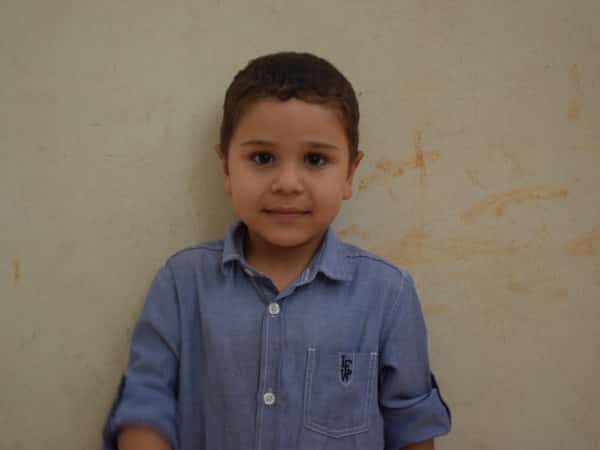 Suliman: An Orphaned Child Living with Another Family