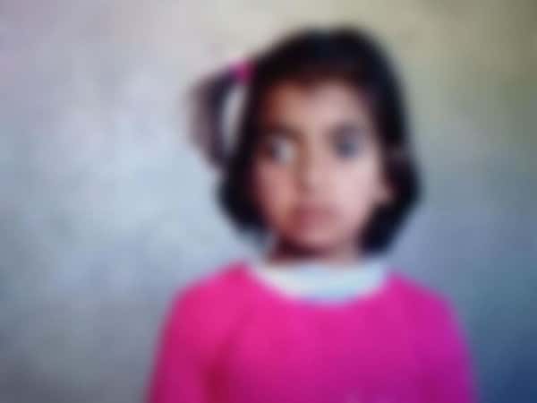 Child suffering from strabismus