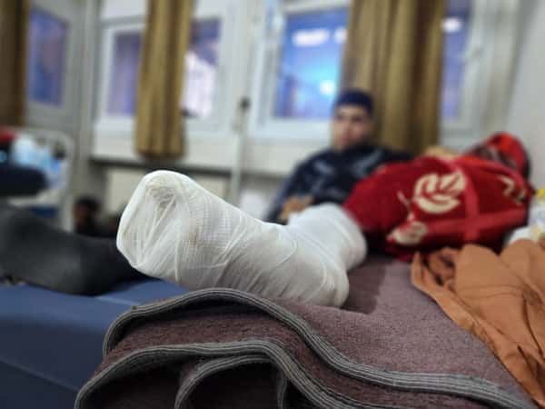 A medical device separates him from recovery