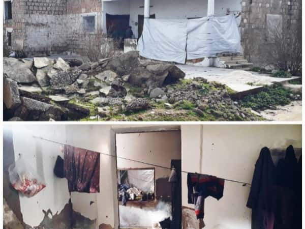 A family living in a ruined house