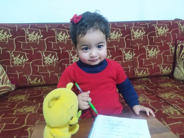 Julia… a childhood smile searching for support.