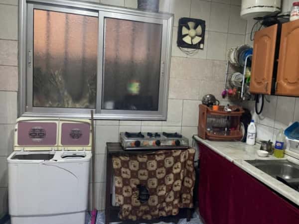 A mother struggling with illness and hardship