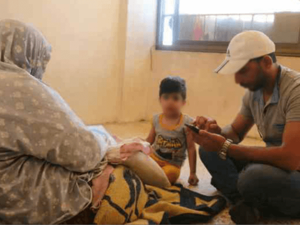 A displaced family living in dire poverty