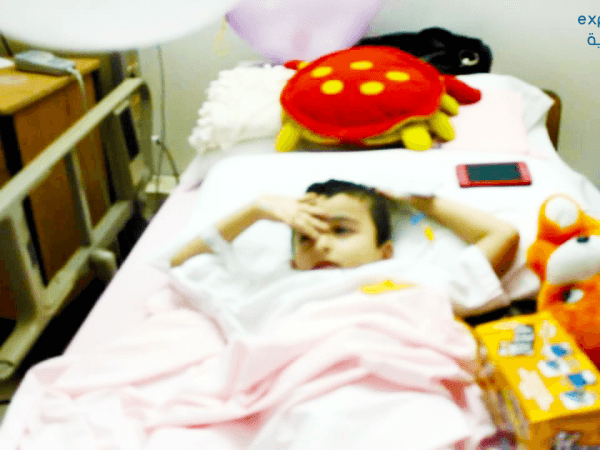 Child suffering from brain atrophy