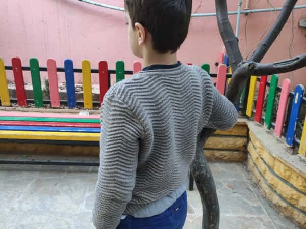 Omar, an orphan from Hama