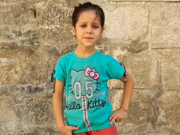 Tala is an orphan girl from Idlib