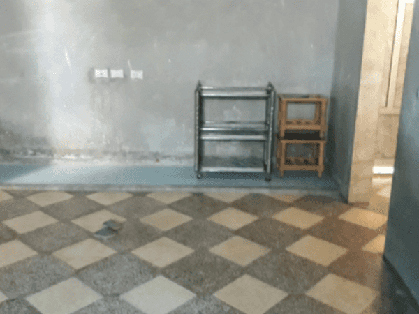 A displaced family living in a poor house
