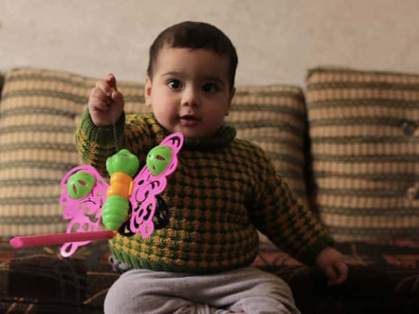 Mahmoud is an orphan baby and needs your help