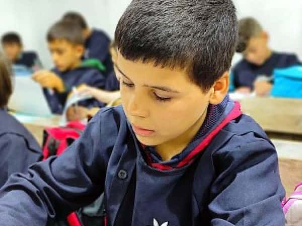 Ahmed is an orphan child waiting for your help.