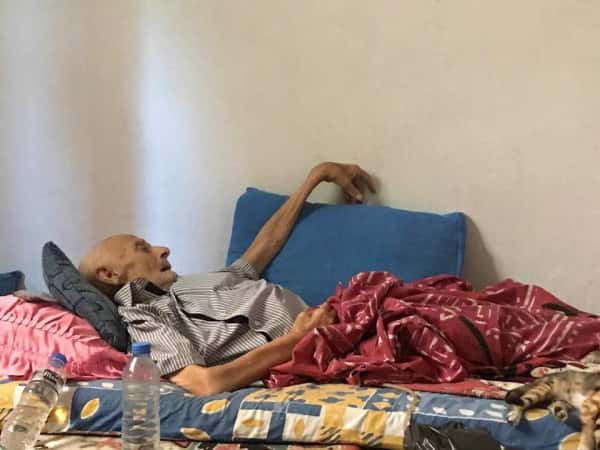 Elderly refugee suffering from cancer