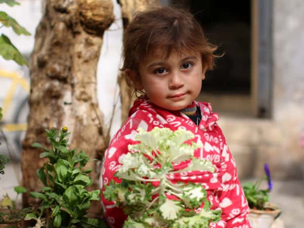Qamar is an orphan child from Idlib.