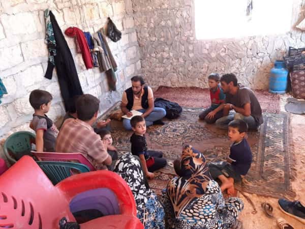 A mother with her children need your support