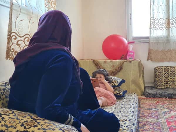 Elderly, affected by what she has gone through immensely