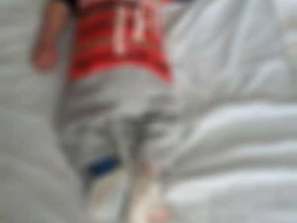 An infant in need of medical expenses