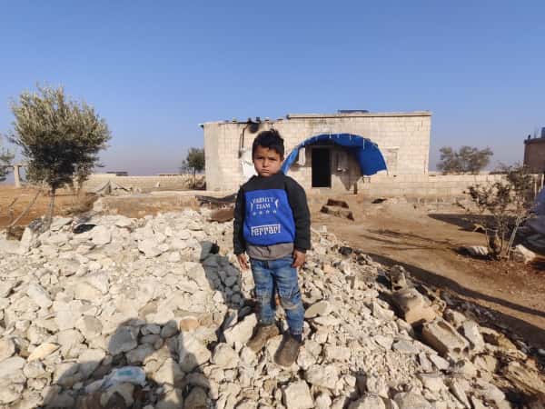 a destroyed house and an ill child!