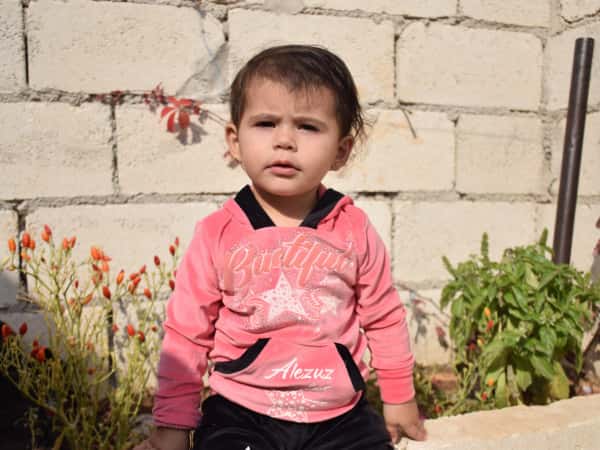 Our child, Batoul, is an orphan from Idlib Governorate.