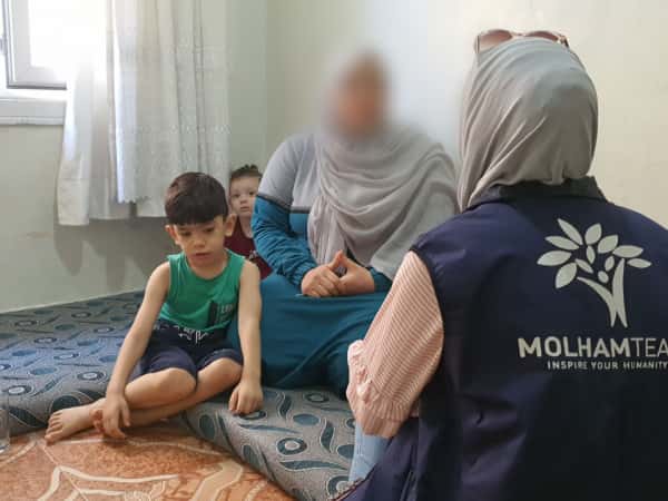Their debts have accumulated because of a surgery and they lost their home due to the earthquake