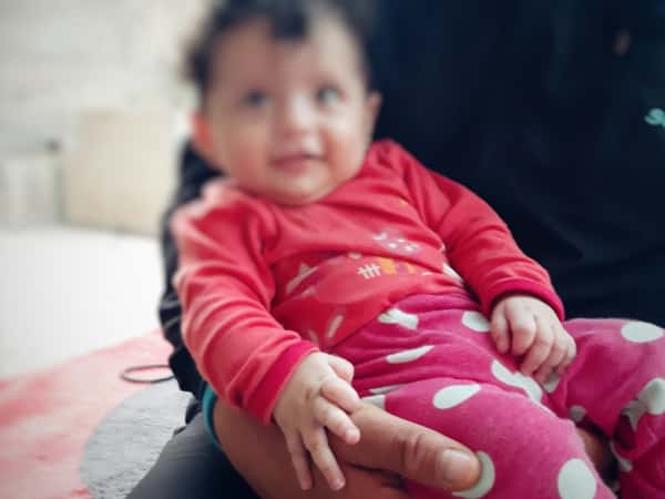 A family needs baby milk for their newborn twin