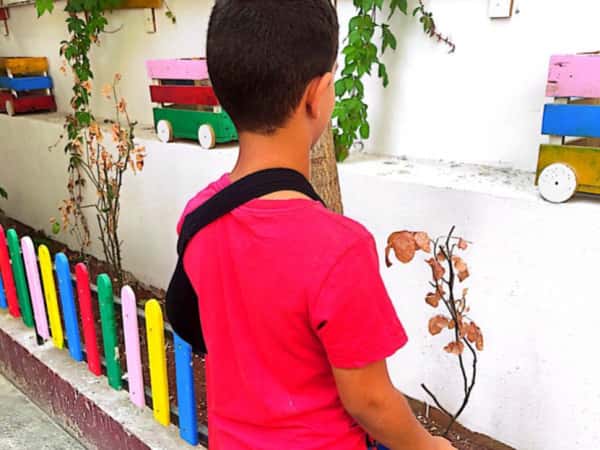 Mayar is an orphaned boy from Idlib city