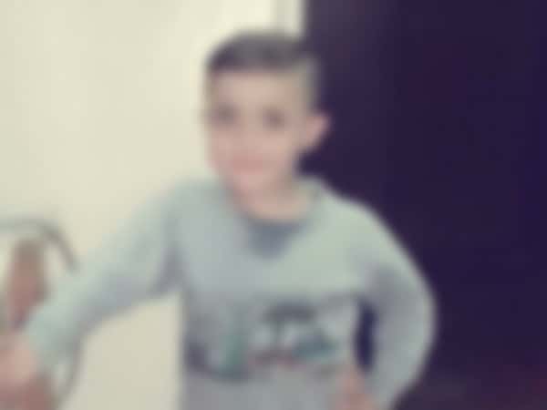 Child suffering from a muscular disease