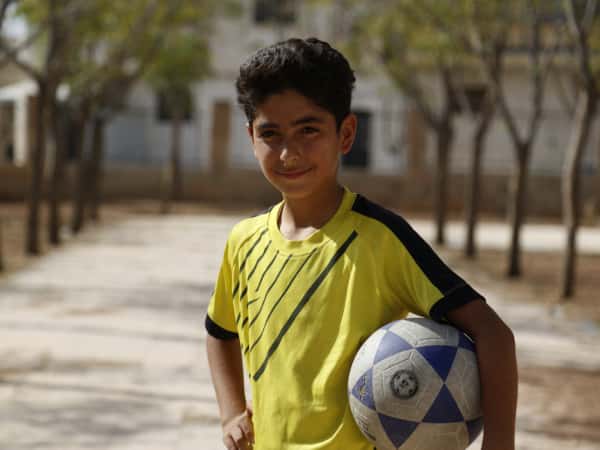 Mahmoud is an orphan child from Aleppo.