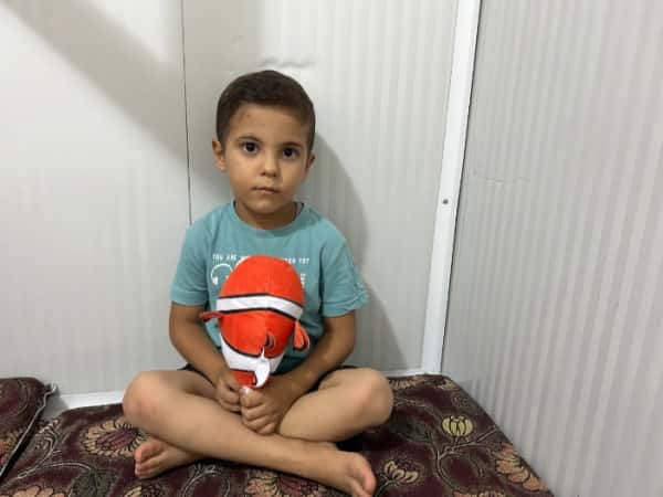 Yazan becomes an orphan child due to the earthquake.
