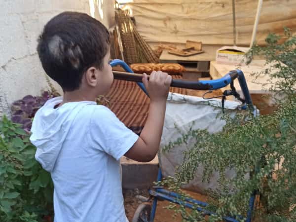 Muhammad's childhood goes between cerebral atrophy and a hole in the heart