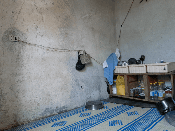A family lives in a fuel warehouse