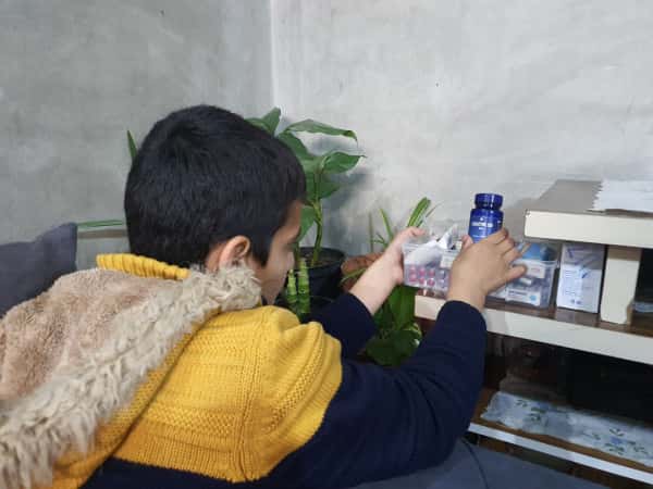 A child vomiting blood in need of urgent treatment!