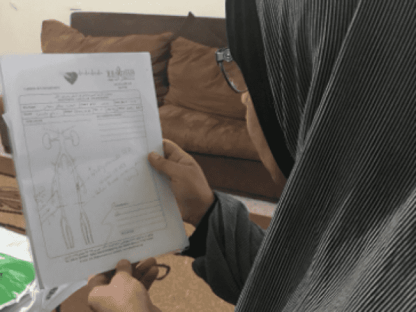 A patient woman needs a cardiac catheter and treatment costs