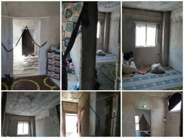 A family living in a poor house